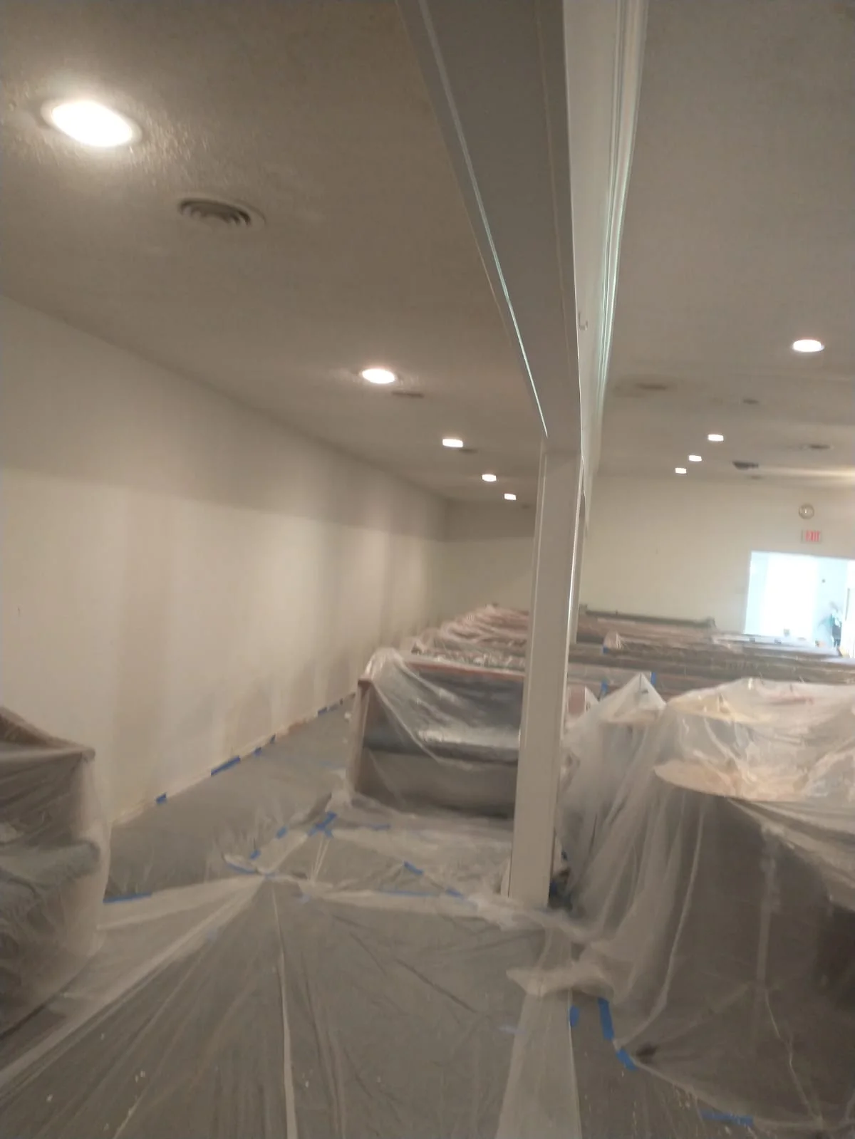 Protected pews and work area during the same church interior project