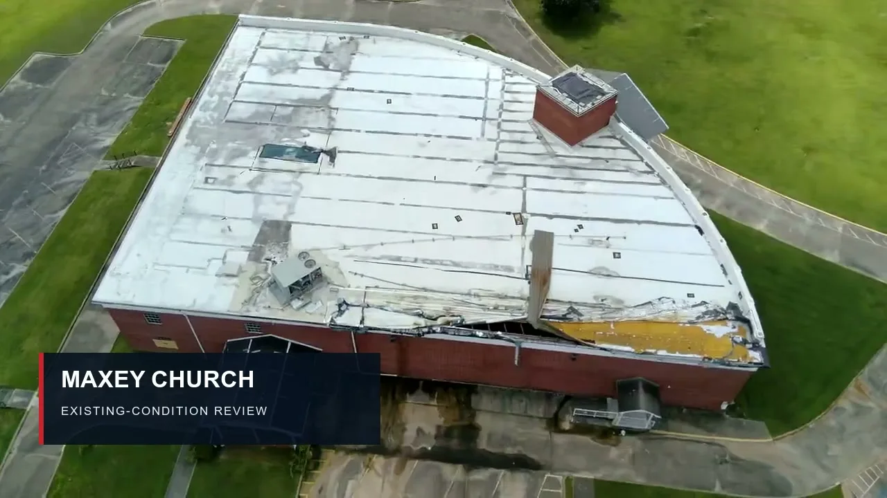 Aerial view of existing roof conditions at the Maxey church project