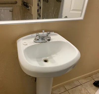 Completed sink fixture in a shared-housing conversion