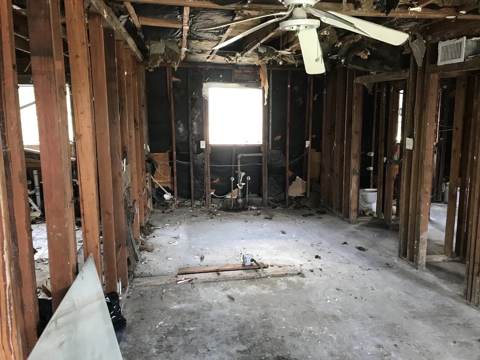 Stripped apartment interior at the beginning of the Sloan renovation